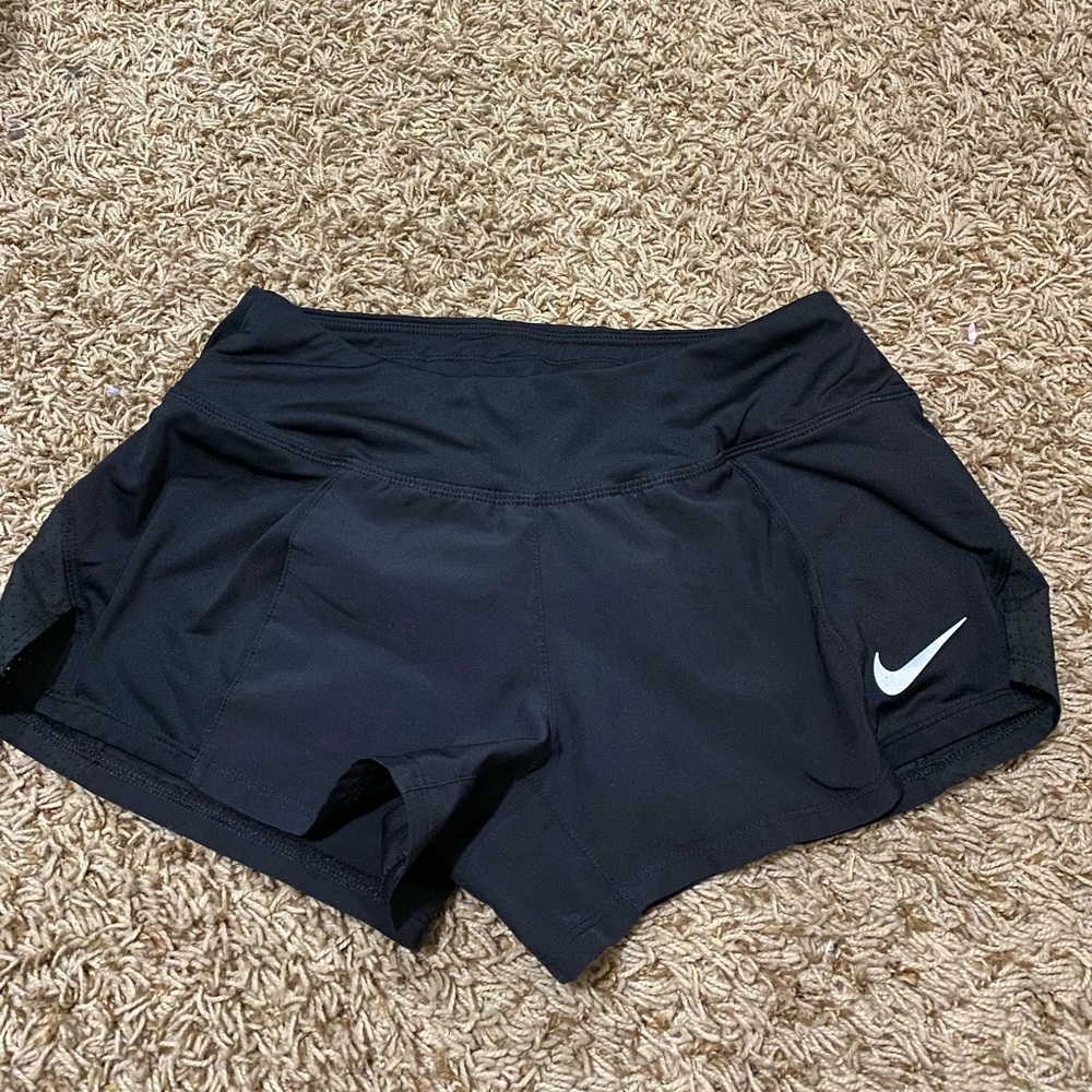 Black Nike running shorts